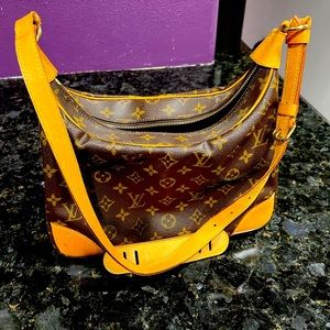 Louis Vuitton handbag with strap